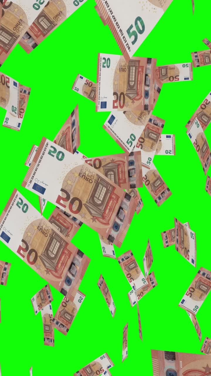 denaro in euro che cade sullo schermo verde