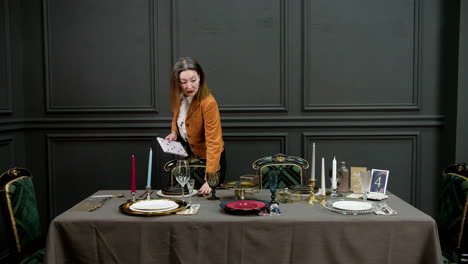 Asian woman organizing ornaments on a table