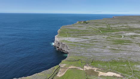 drone establishing shot of dun angus fort inis more aran islands on the west coast of ireland perched high above the atlantic ocean