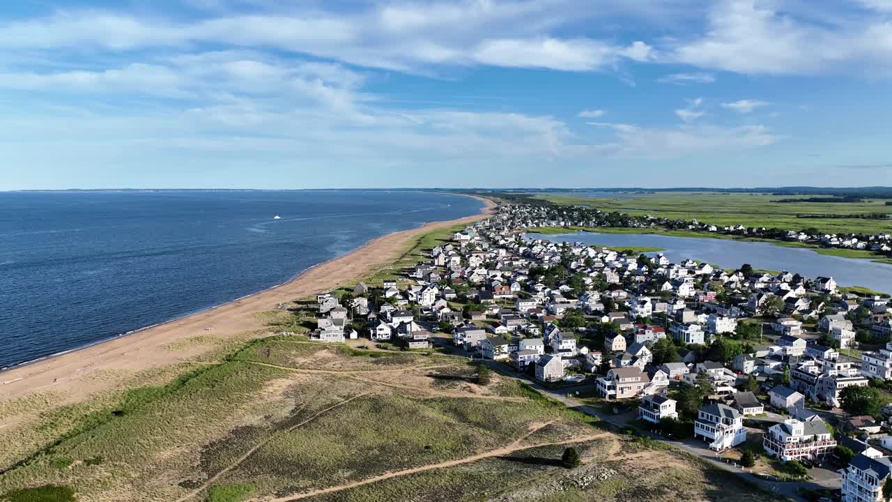 Drone view of Plum Island, Massachusetts beach on a partly cloudy summer day