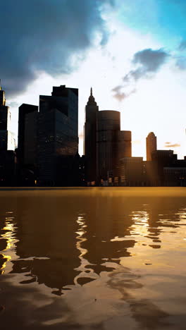 sunset cityscape with reflections in the water