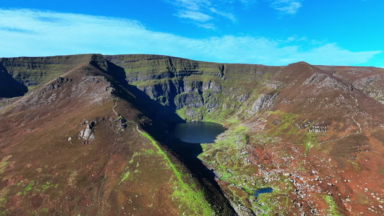 Drone Mountain landscapes panning right Coumshingaun Lake beauty spot high in The Comeragh Mountains Waterford epic locations