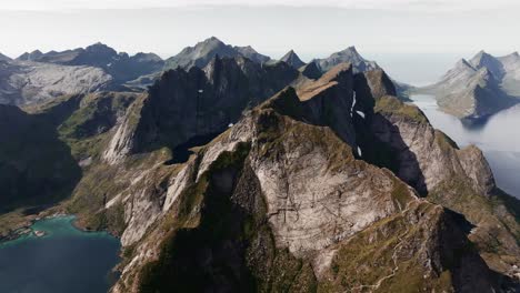 Aerial-view-of-Segla-mountain-above-the-sky,-Norway-during-summer