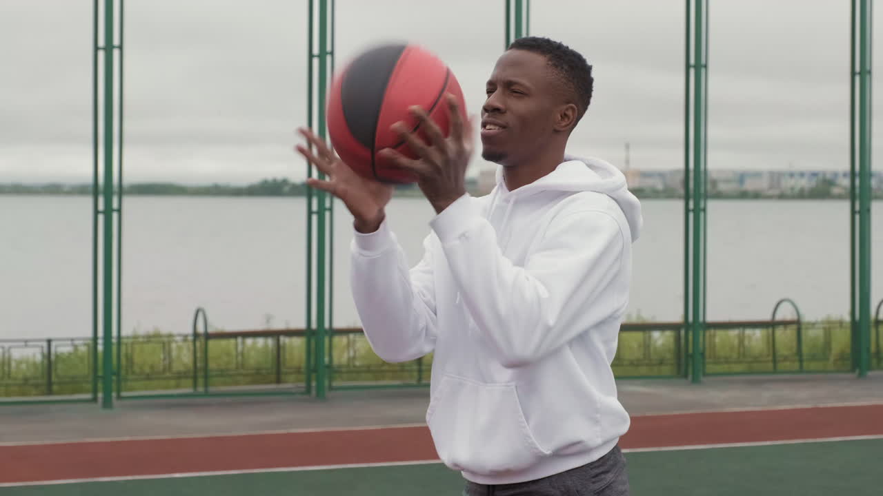 Man Playing Basketball