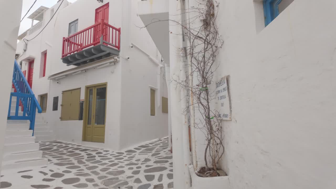 A peaceful walk through the narrow whitewashed alleys of Mykonos. Traditional Cycladic houses, cobblestone paths, and the charm of Greek island life