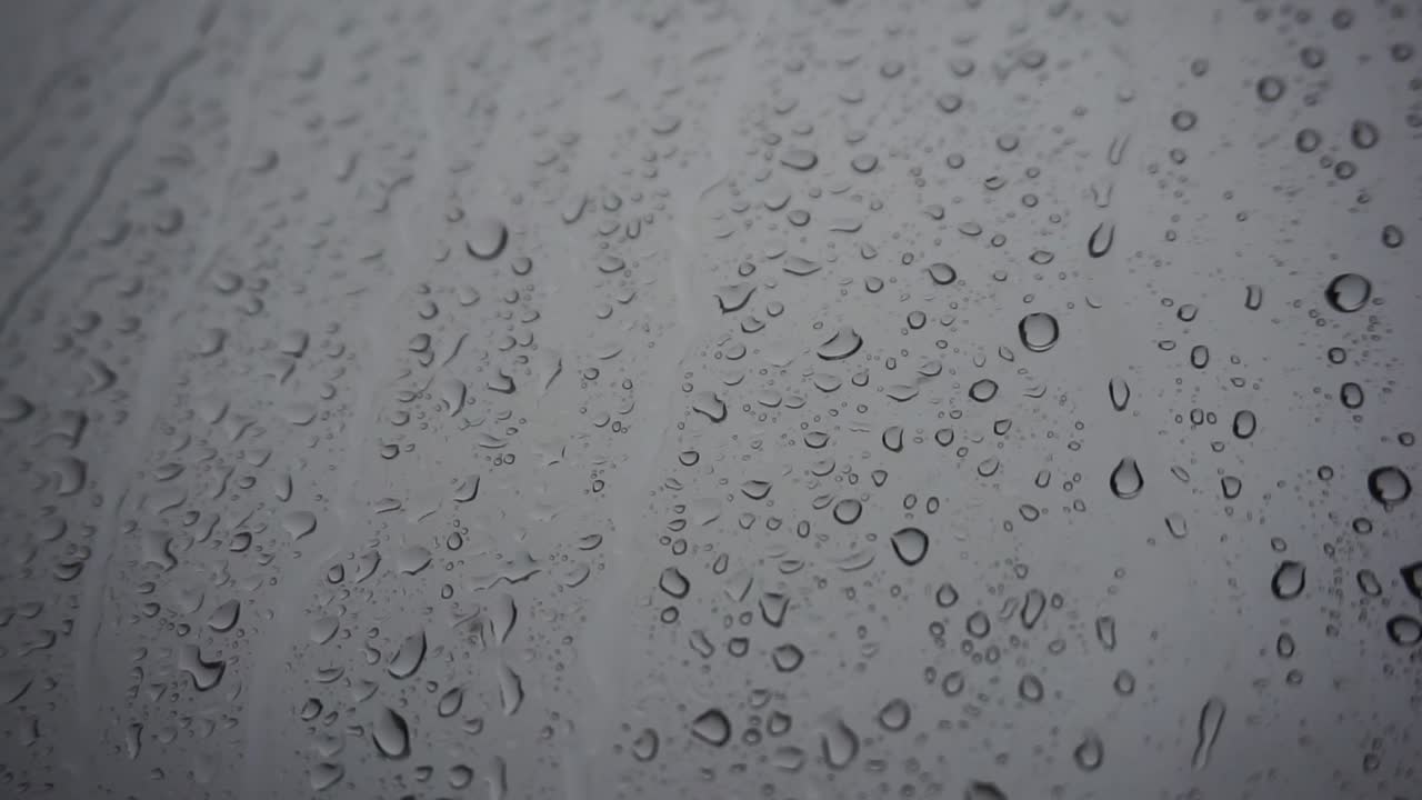 Rain storm on a window