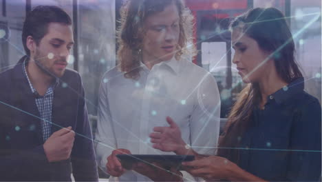 animation of network of connections with icons over diverse colleagues discussing work