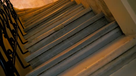 rotating old marble stairs