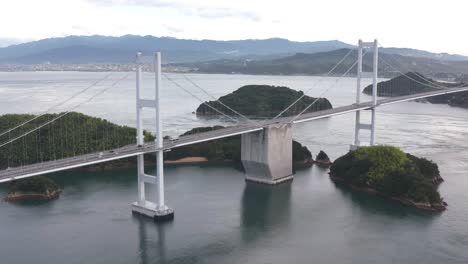 aerial establishing shot of kurushima kaikyo, world's longest suspension bridge