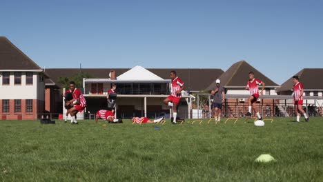 rugby players training on the field