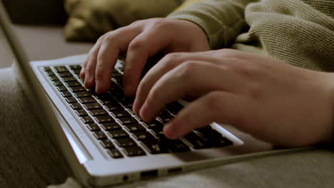 closeup of man typing