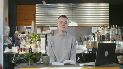 woman working in a cafe