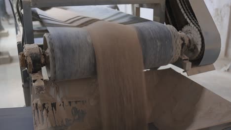 heated material is passing to conveyor line to next process