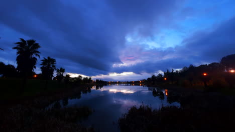 dramatic sky and water reflections – twilight lagoon timelapse