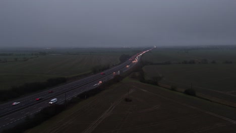 evening rush hour m11 motorway essex uk in foggy driving conditions drone,aerial