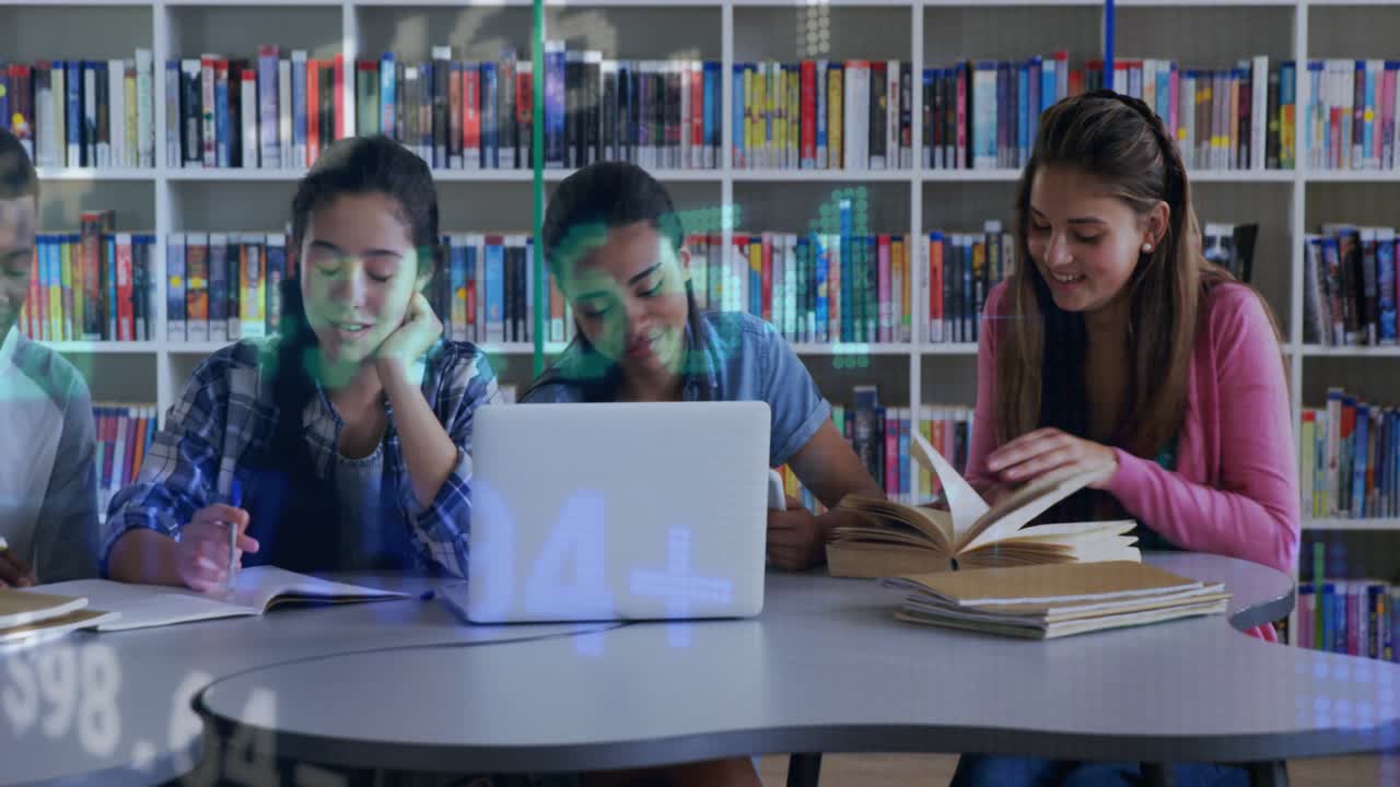 Students studying at school table, laptop opening initiating data overlay, flipping yellow notebook