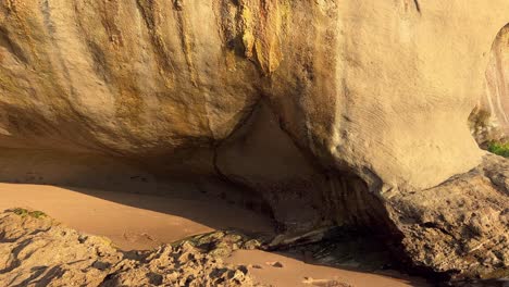 Dripping-cliffs-at-sunset,-day