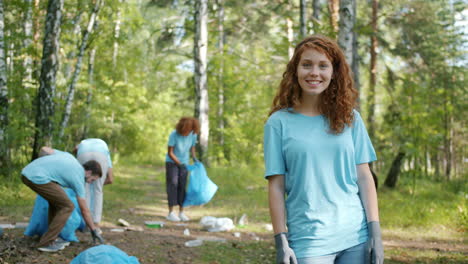 volunteers cleaning up a forest