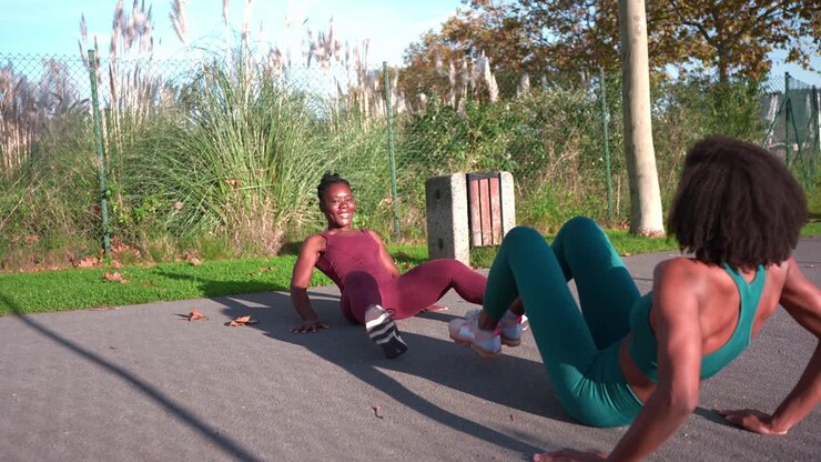 Two women exercising outdoors