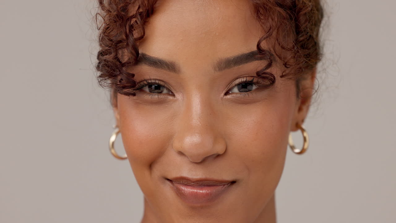 Smiling woman with curly hair