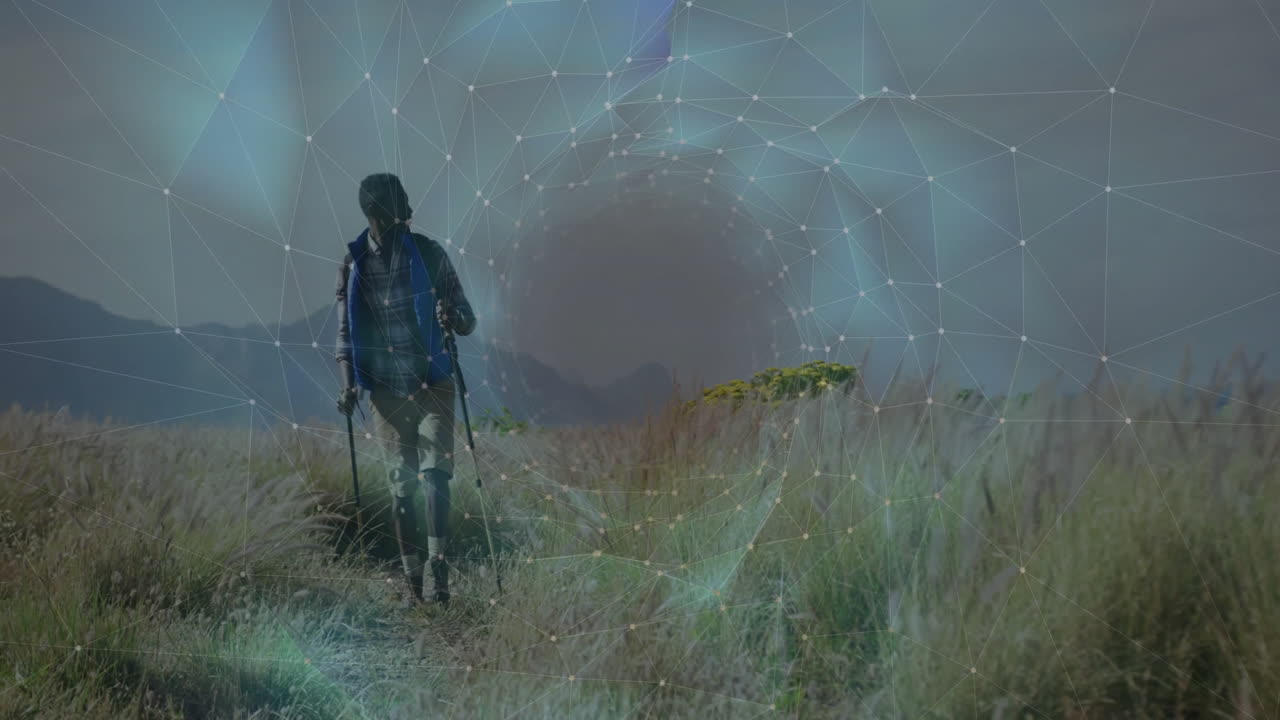 male hiker walking mountain meadow trail, with animated prosthetic leg health data overlay