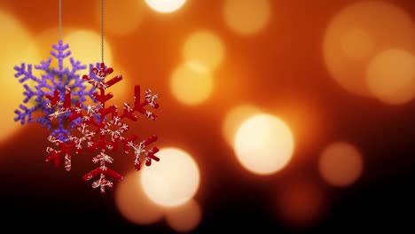 los adornos de copos de nieve de navidad se balancean en el fondo de bokeh archivo de bucle