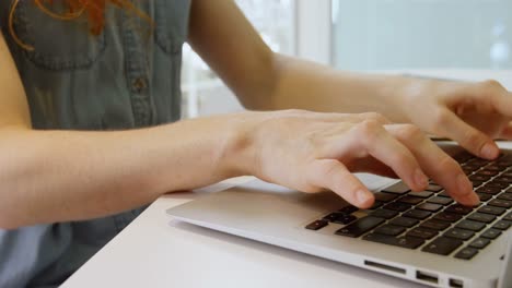 executive using laptop in office 4k