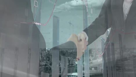 비즈니스맨과 비즈니스맨이 손을 흔드는 중간 섹션에서 통계 데이터 처리