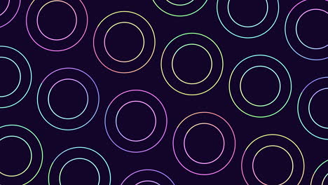 Neon rainbow rings pattern in rows on black gradient