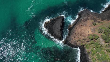 top down view of fingal head causeway, rock formation in new south wales, australia - drone shot