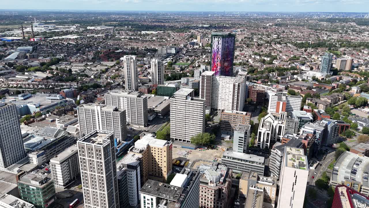 Pull back drone aerial reverse reveal Croydon town centre south London UK