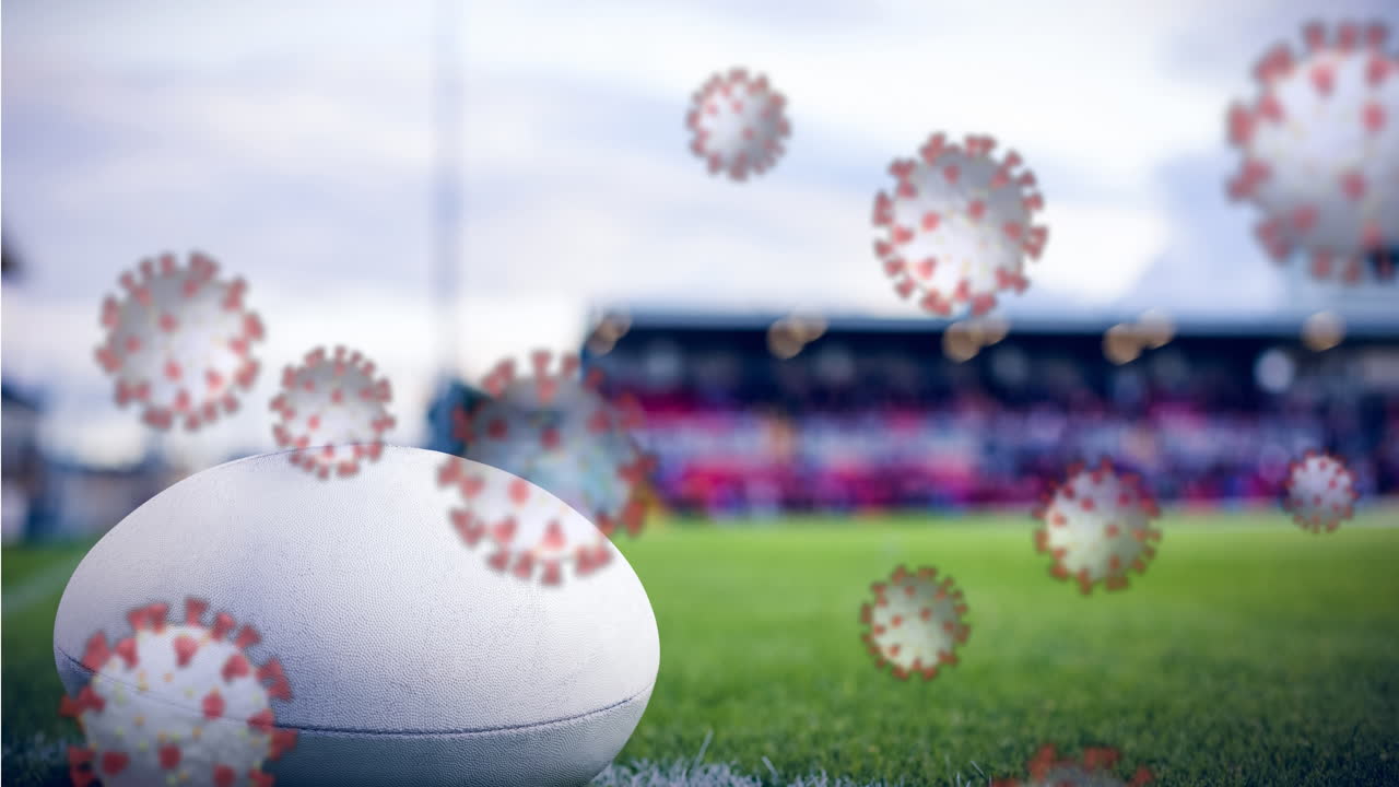 스포츠 경기장에서 럭비 공을 상대로 코로나19 세포