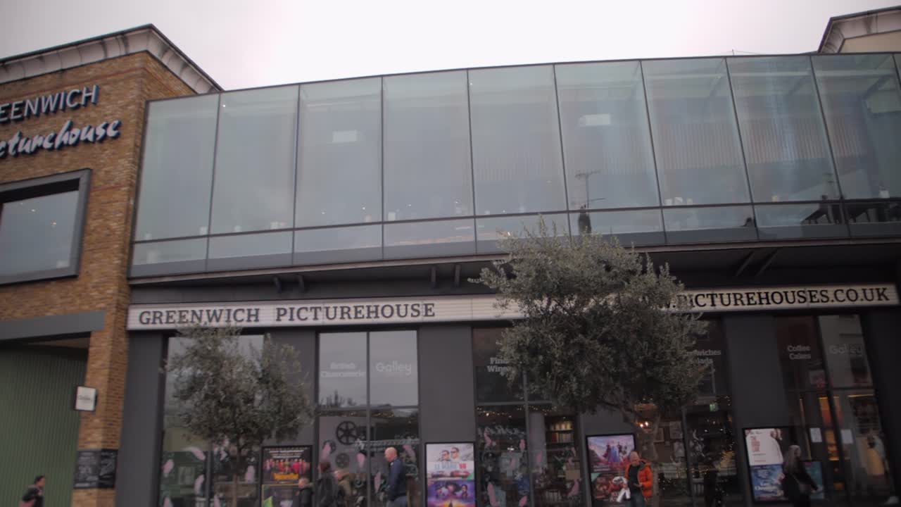 Reveal the Greenwich Picturehouse behind the bus station.
