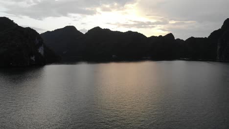 Overhead-drone-view-of-the-ocean-and-limestone-islands-of-Halong-Bay-Vietnam