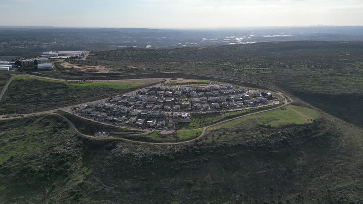 Isolated panoramic beautiful aerial drone 4K video of Sal'it Israeli settlement- Israel
