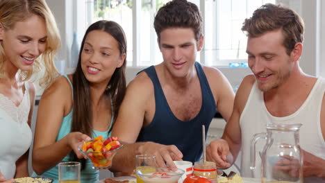 Friends-having-breakfast-in-the-kitchen