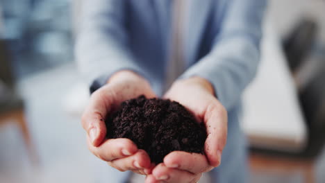 soil in hands