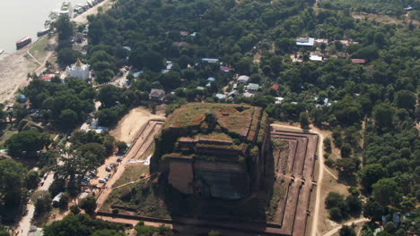 Drone-panning-shot-over-the-Mingun-Pahtodawgyi,-the-largest-unfinished-Pagoda-in-Myanmar