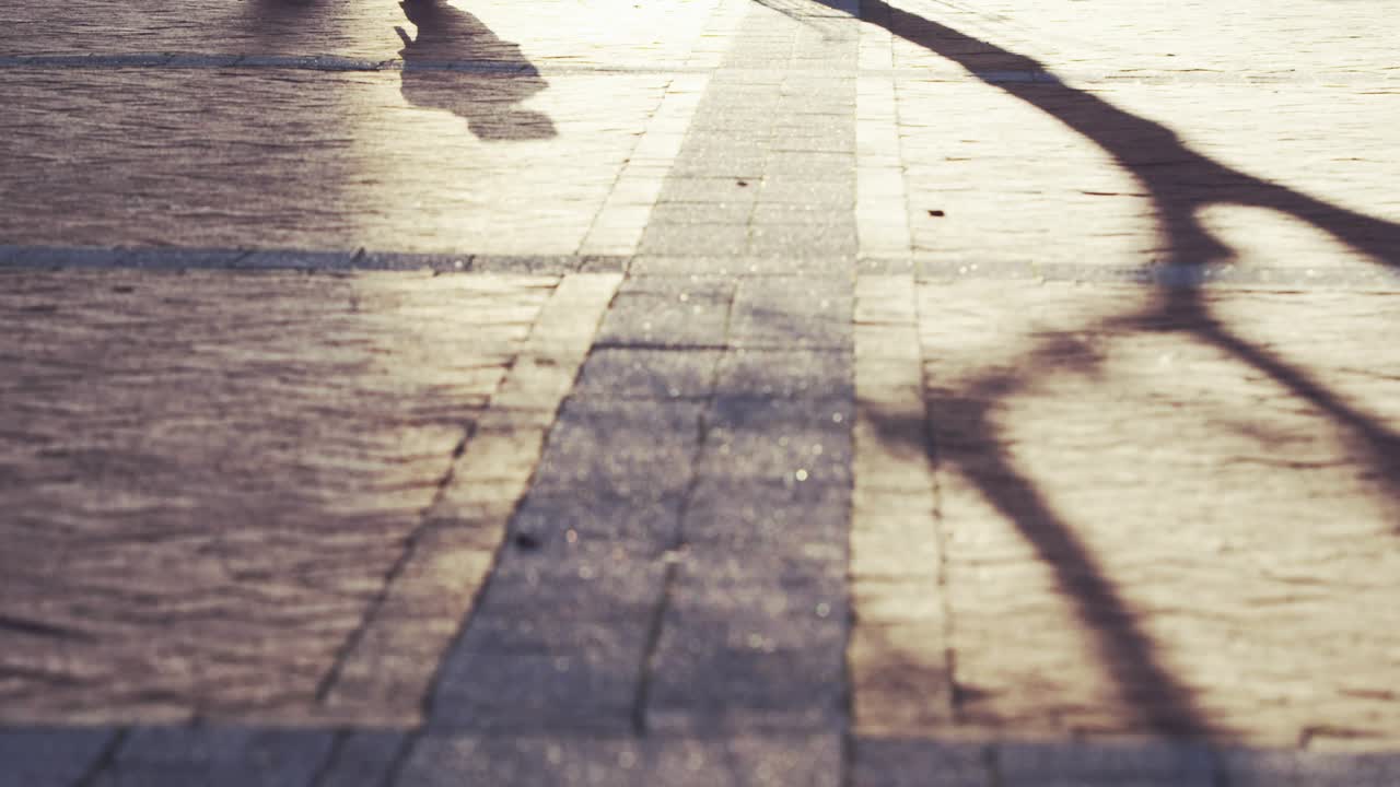 Clock overlay appearing, forming rings, rotating hands while walkers' feet crossing, showing time