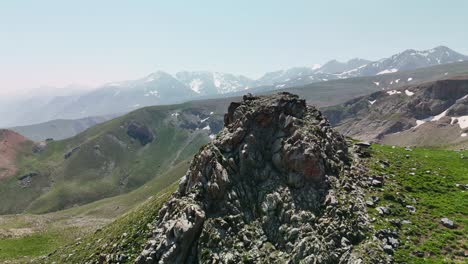 breathtaking mountain landscape with green slopes under clear sky