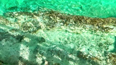 very clean water in the beach of tulum in mexico