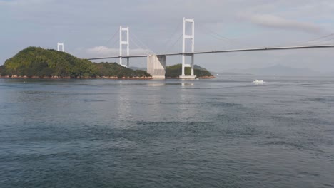 4k flying forward to reveal kurushima kaikyo bridge, japan