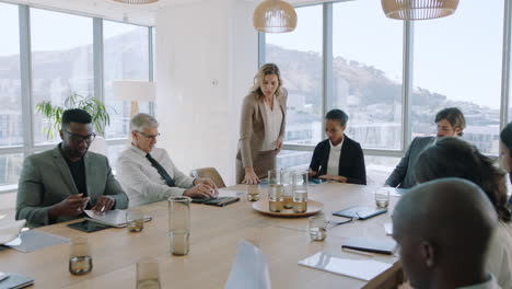 beautiful business woman team leader discussing creative ideas with shareholders briefing colleagues sharing company development strategy in office boardroom meeting 4k