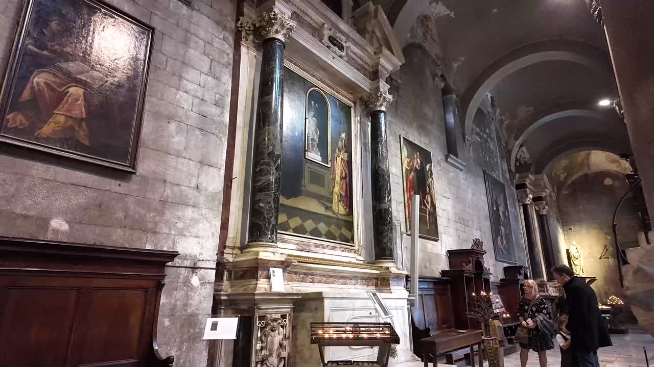Roman catholic church paintings holy worship place Lucca Italy cathedral
