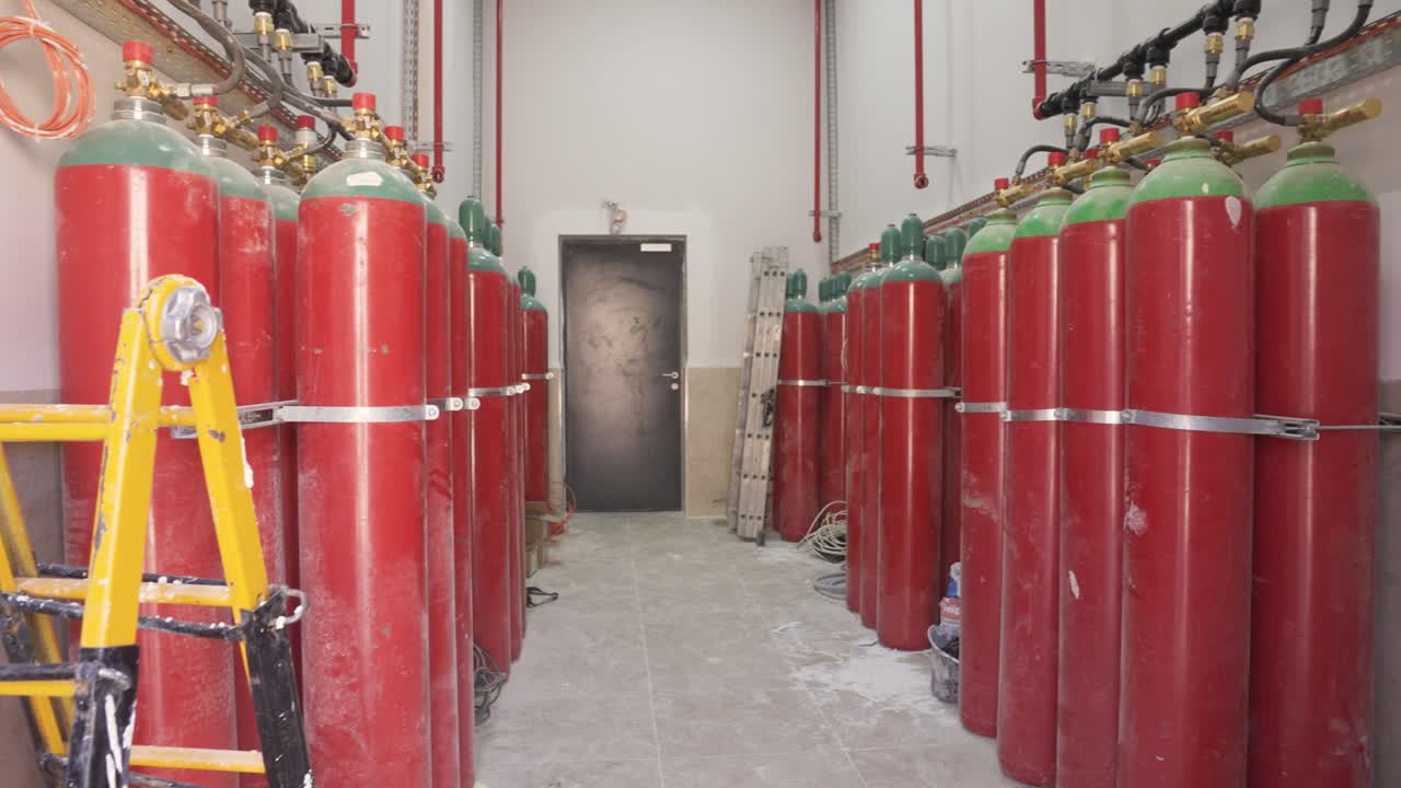 The fire protection room for a data center or server room, filled with tanks of clean agent gas, designed to extinguish a fire without damaging sensitive electronic equipment