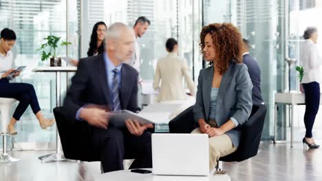 time-lapse of businessman and businesswoman interacting with each other