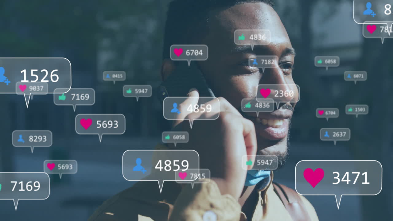 animación de iconos de los medios sobre un hombre afroamericano hablando en un teléfono inteligente