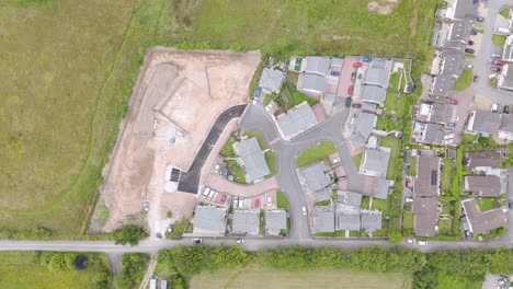 aerial view of a residential housing development with adjacent construction site