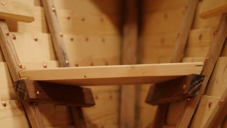 wooden seat in bow of clinker wooden dinghy
