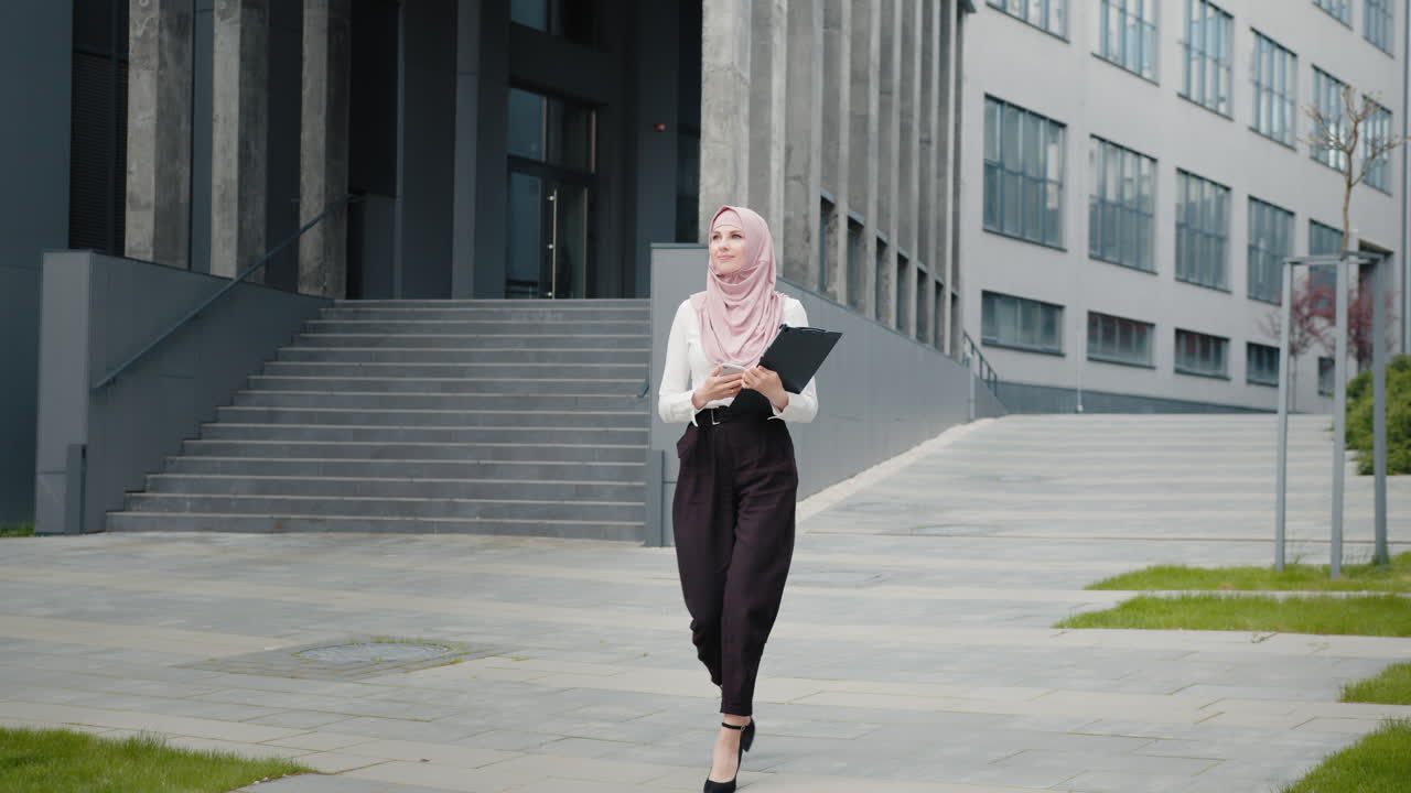 Business Woman in Hijab Walking